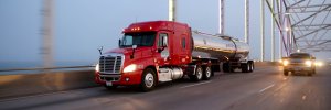 Heavy-Duty Truck Excise Tax Repeal: 7 Powerful Benefits and Risks for Tank Fleets 8 Groendyke Transport - Tanker on CPCH Bridge