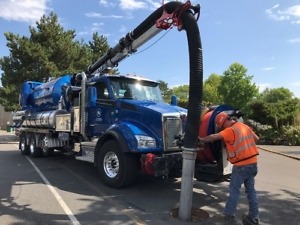 City of Kirkland Kenworth T880 Driver Craig Merrill is shown in action, City Using Vacuum Trucks for Flooding