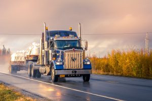 Truck driving on the road in Alaska