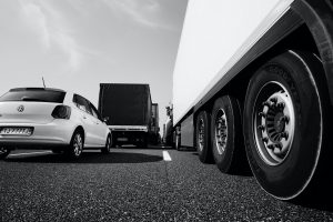 Trucks and cars on Highway bumper to bumper