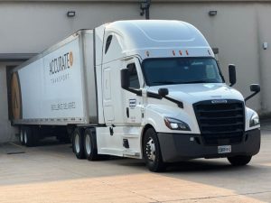 Accurate Transport Houston Terminal with truck and trailer at dock