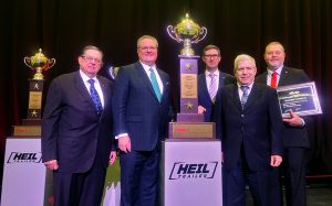 Groendyke Safety Award: A Milestone Achievement for the Industry Leader | 9th Win From left: Chairman of the Board John D. Groendyke, CEO Greg Hodgen, Executive Vice President Aaron Harmon, President Joe Morrissey, and Vice President of Safety and Training Chris Pape accept the NTTC North American Safety Champion Award in the Harvison Division for Groendyke Transport Tuesday in Las Vegas.