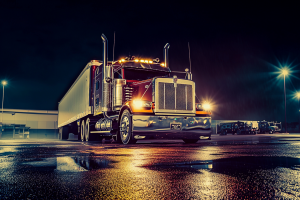 Truck parked at night in a lot