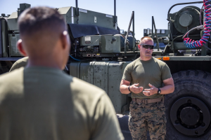 Major $49M EnTrans Marine Corps Contract Drives Off‑Road Trailer Upgrades 6 Training shot highlights USMC procedures for loading/hauling on the M870A2 platform.
