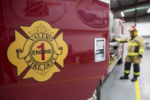 Valero Port Arthur Blast: 12 Warning Signals for Fuel Markets 6 A refinery fire truck and firefighter in Valero safety gear.