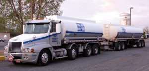 Global Refinery Crunch: 8 Critical, Sobering Findings on Diesel and Jet Fuel 4 Freightliner double tanker rig in Moses Lake, Washington.