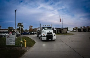 ARKO’s $235 Million USPP Deal Would Add Two Terminals and a Fuel Fleet 1 U.S. Petroleum Partners tankers positioned beneath a terminal fuel-loading rack.