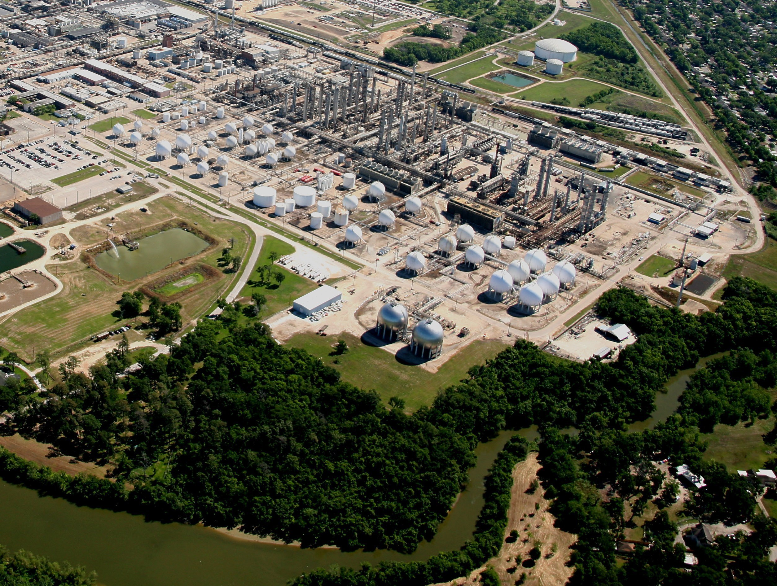 Aerial view of TPC Group’s Houston chemical complex with process units, storage vessels and railcars