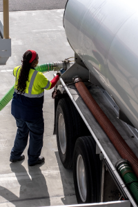 EPA Proposes Full Approval of Maricopa Gasoline Cargo-Tank Rule 6 Fuel transporter operator connects an air-vent hose to a tanker trailer.