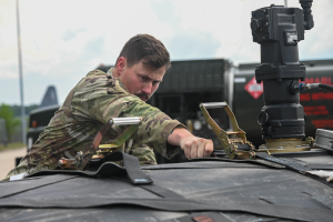 Stephens Pneumatics Selected to Supply Military Agile Fuel Systems 5 Airman adjusts securing straps across a flexible fuel bladder at Little Rock Air Force Base.